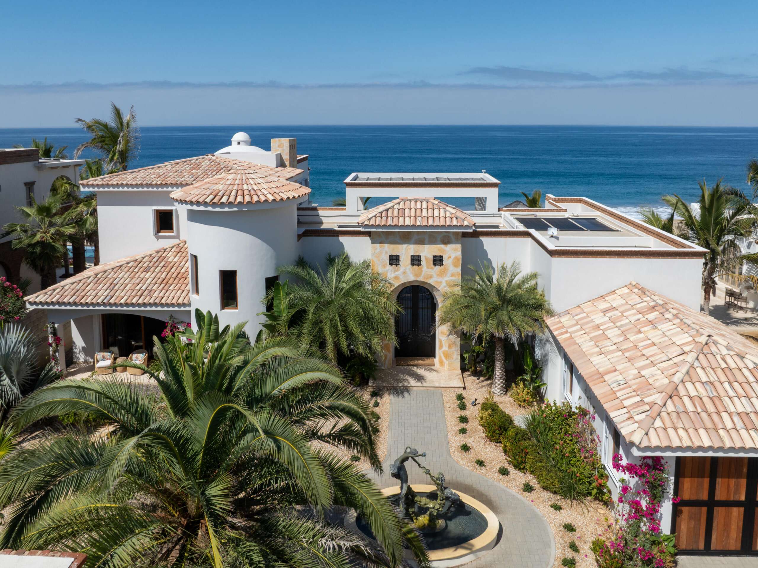 Cabo Luxury Rancho Nuevo This is a one of a kind estate property consisting of two oceanfront homes. The oceanfront estate with 3 grand bedrooms/4.5 baths, interior/exterior living, 2 kitchens, 2 dining areas, butler's pantry, 2 laundry rooms, and attached garage. Two primary suites are situated upstairs and downstairs.. No expense was spared in exquisite high end finish out such a brick bovedas, brick barrel kitchen ceiling, Heston appliances.Onyx countertops with hidden electrical outlets. This estate was built with the highest quality of materials and design. Dual pane hurricane doors and windows plus hurricane shutters encompassing even the covered patio. The orientation is perfectly situated to capture the Pacific, which sits on 3000m2 lot, walled with electronic gated car gate located high on a bluff. See mo Imagine only 35 minutes from Cabo San Lucas and 15 minutes from Todos Santos, lies the oceanfront gated community known as Rancho Nuevo. This one of a kind estate property consists of an oceanfront home with 3 oversized suites all with luxurious en suite bathrooms, walk-in closets, of which two are oceanfront. The upstairs primary has two terraces, one with built in seating compete with a fire pit. The home was constructed with the highest quality materials and orientation to take in the ocean – 25 Camino Grande Pedregal, Cabo San Lucas, BS