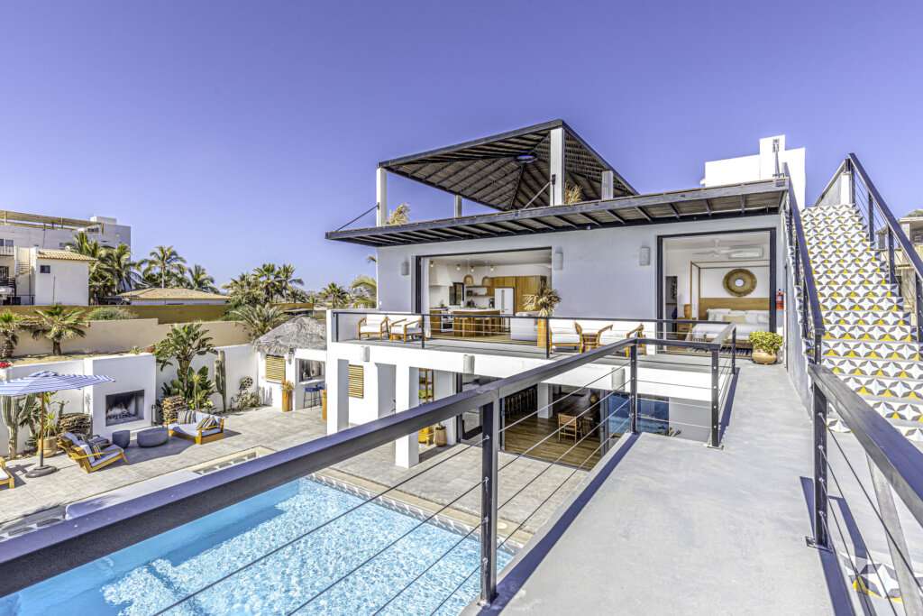 Cabo Luxury Cerritos Experience oceanfront living at Casa Blanca Sur, a fully renovated and turnkey estate on Cerritos Beach offering 11 bedrooms, 9 full baths, 4 half baths, a private pool, rooftop terrace, and sweeping for sale