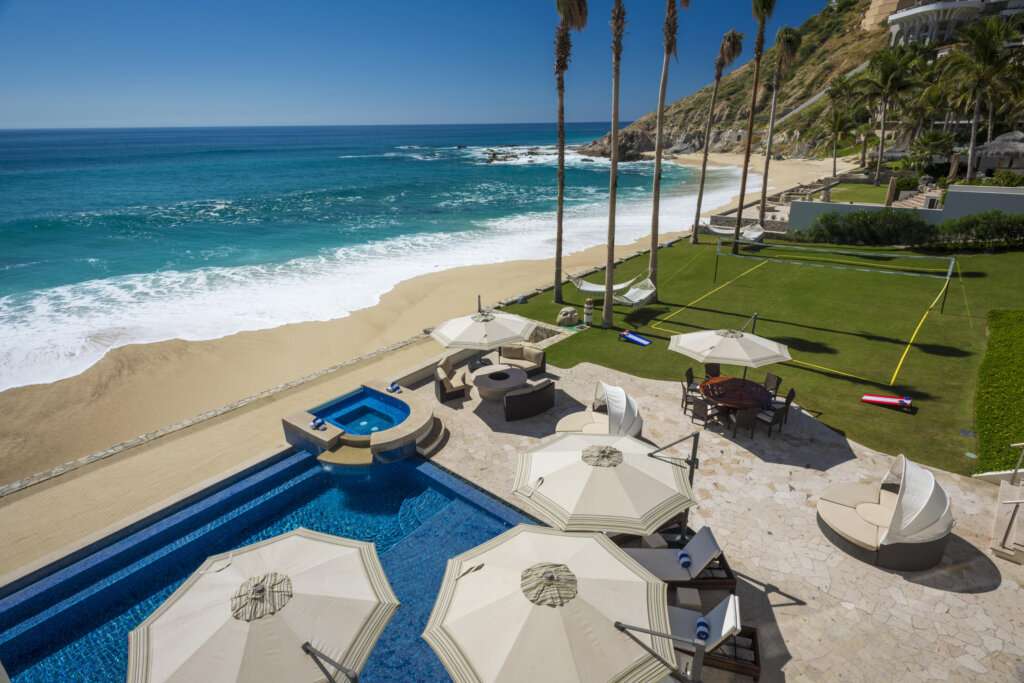 Cabo Luxury Palmilla Sur Rare true beachfront estate in Palmilla Sur featuring approximately 62 meters of ocean frontage. This exceptional residence offers 5 bedrooms, 5 full bathrooms, and 4 half bathrooms on a generous oceanfront lot. Expansive decks and patios provide breathtaking, unobstructed ocean for sale