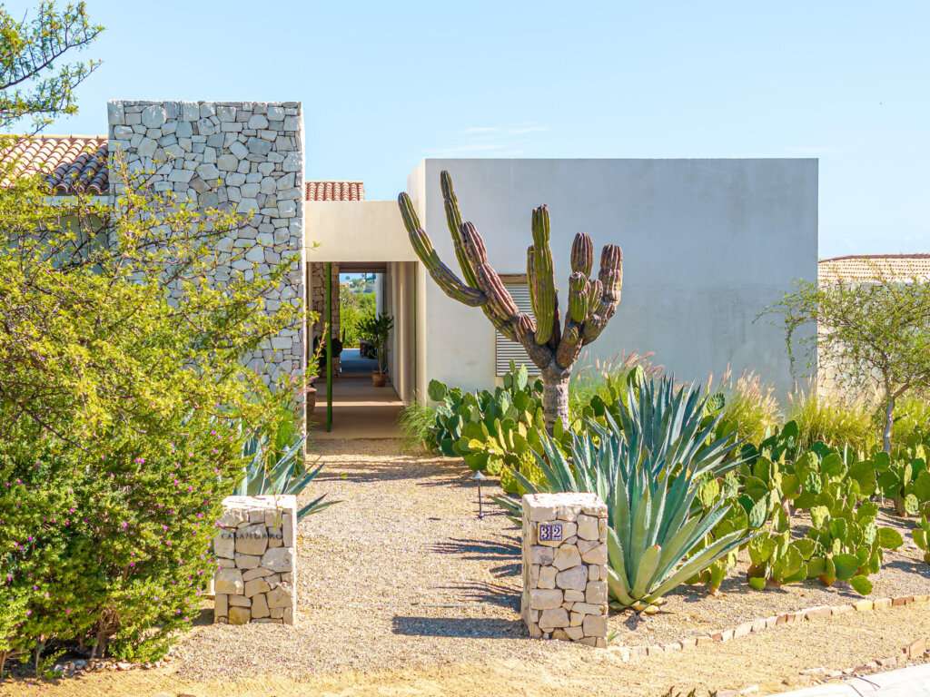 Cabo Luxury Oasis Palmilla Set on a rare oversized lot within Oasis Palmilla, this single-level hacienda-style residence offers exceptional privacy and a true sense of desert seclusion. Surrounded by low-density landscape, the home enjoys peaceful afternoons with seamless integration with nature.The 4,792 A/C sq. ft. layout includes 4 bedrooms, 4 full baths, 1 powder room, a media room, and a separate maid's quarters, all thoughtfully arranged on one level. A charming central courtyard with mature Torote trees anchors the home, while outdoor living areas are designed for family gatherings andentertaining. Additional features include solar panels with a bidirectional meter, a spacious primary suite with a large dressing room, a bunk bedroom, a large garage, and a two-car trellis. This is the only completed built home currently available for sale in Oasis, offering immediate value in an established A-community with no remaining one-acre lots.Eligible for Club 96 membership (subject to approval and fees). for sale