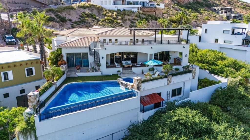 Cabo Luxury Cabo Colorado Architectural Elegance & Split-Wing Layout.This home is a triumph of modern architecture, beautifully finished with gorgeous marble floors throughout and premium granite countertops.A Grand Welcome: A generously sized entry foyer warmly ushers you into the home, setting a tone of spacious elegance from the very moment you arrive.Open-Concept Living: The main living room features dramatic vaulted ceilings, creating a grand, airy atmosphere. Sliding doors in both the living and dining room offer a seamless transition to the pool and outdoor deck while framing spectacular ocean – 8, Villa Ocho, San Jose Corridor, San Jose Corridor, BS