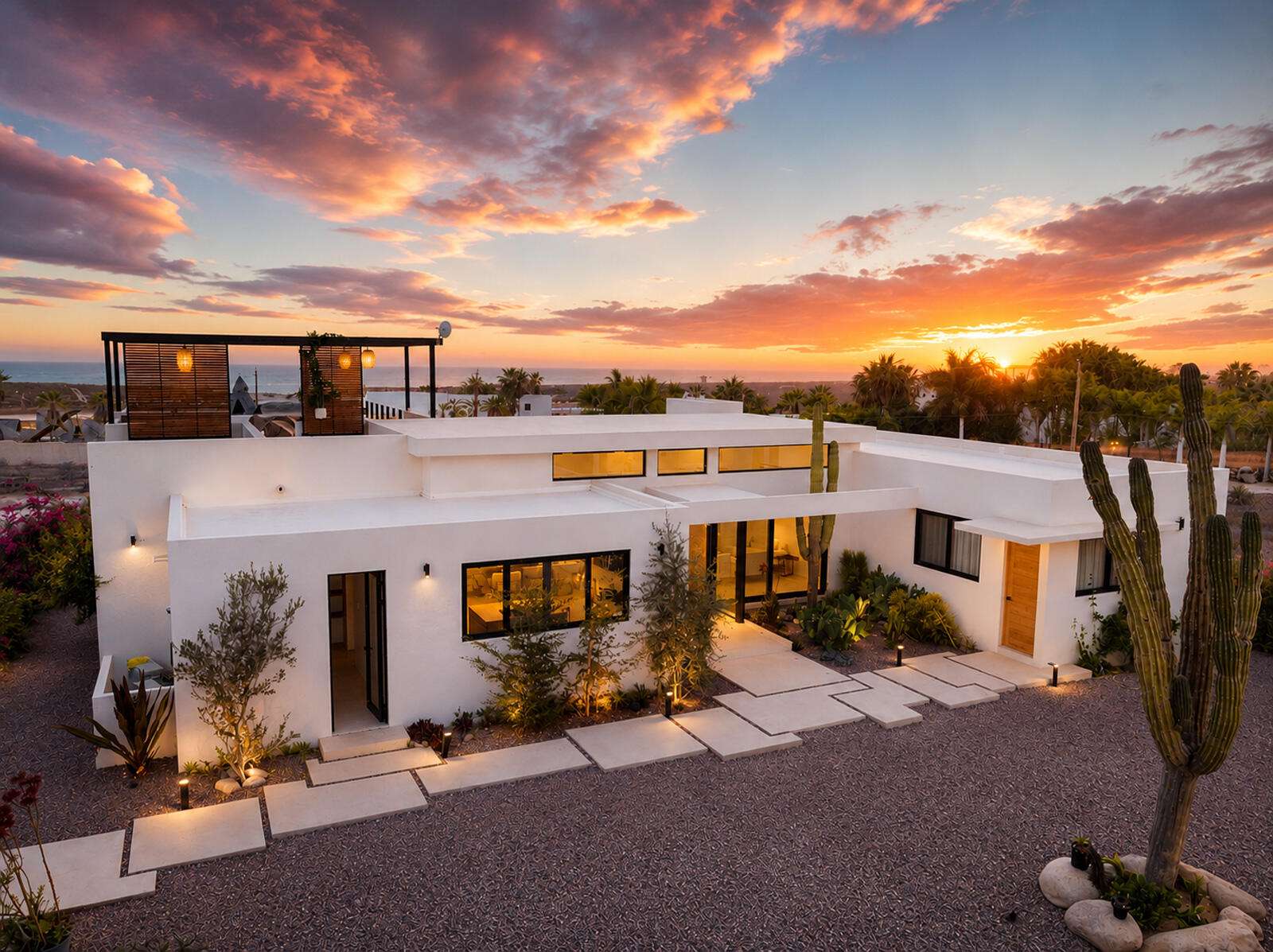Cabo Luxury Las Tunas Ananda del Mar is a refined luxury residence crafted to exceed the expectations of even the most discerning buyer. Nestled on a private 3,000 m² (0.73-acre) lot, it is just a short stroll from the pristine sandy beaches of Las Tunas, where breathtaking sunsets and a peaceful coastal lifestyle await. The home features a thoughtful floor plan with 3 spacious bedrooms, a separate studio, a cozy TV lounge, and 6 full bathrooms, including two primary suites, a guest bedroom, a detached studio, and a dedicated media/family room. Expansive sliding glass doors fill the interiors with natural light while framing tranquil garden – Calle Colibri, Pacific, BS
